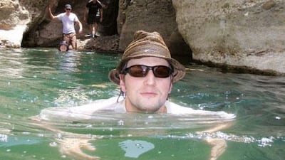A walk turns into a swim at a visit to Hatta Pools.