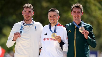 Gold medallist Thomas Pidcock of Great Britain, silver medallist Victor Koretzky of France and bronze medallist Alan Hatherly of South Africa on the podium. Getty Images