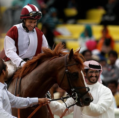 Fathayer (USA) ridden by Royston Ffrench (jockey) after he won the 1800m race at Jebel Ali racecourse. Pawan Singh / The National