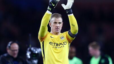 Joe Hart of Manchester City applauds the away supporters after his team’s 2-2 draw in the Uefa Champions League quarter-final first leg match between Paris Saint-Germain and Manchester City at Parc des Princes on April 6, 2016 in Paris, France. (Photo by Clive Rose/Getty Images)