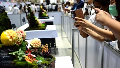 Visitors marvel at the artistic creations.