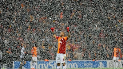 Felipe Melo of Galatasaray lets the snow fall over him on Tuesday night. Bulent Kilic / AFP