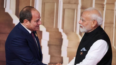 Mr Modi welcomes Mr El Sisi. Reuters