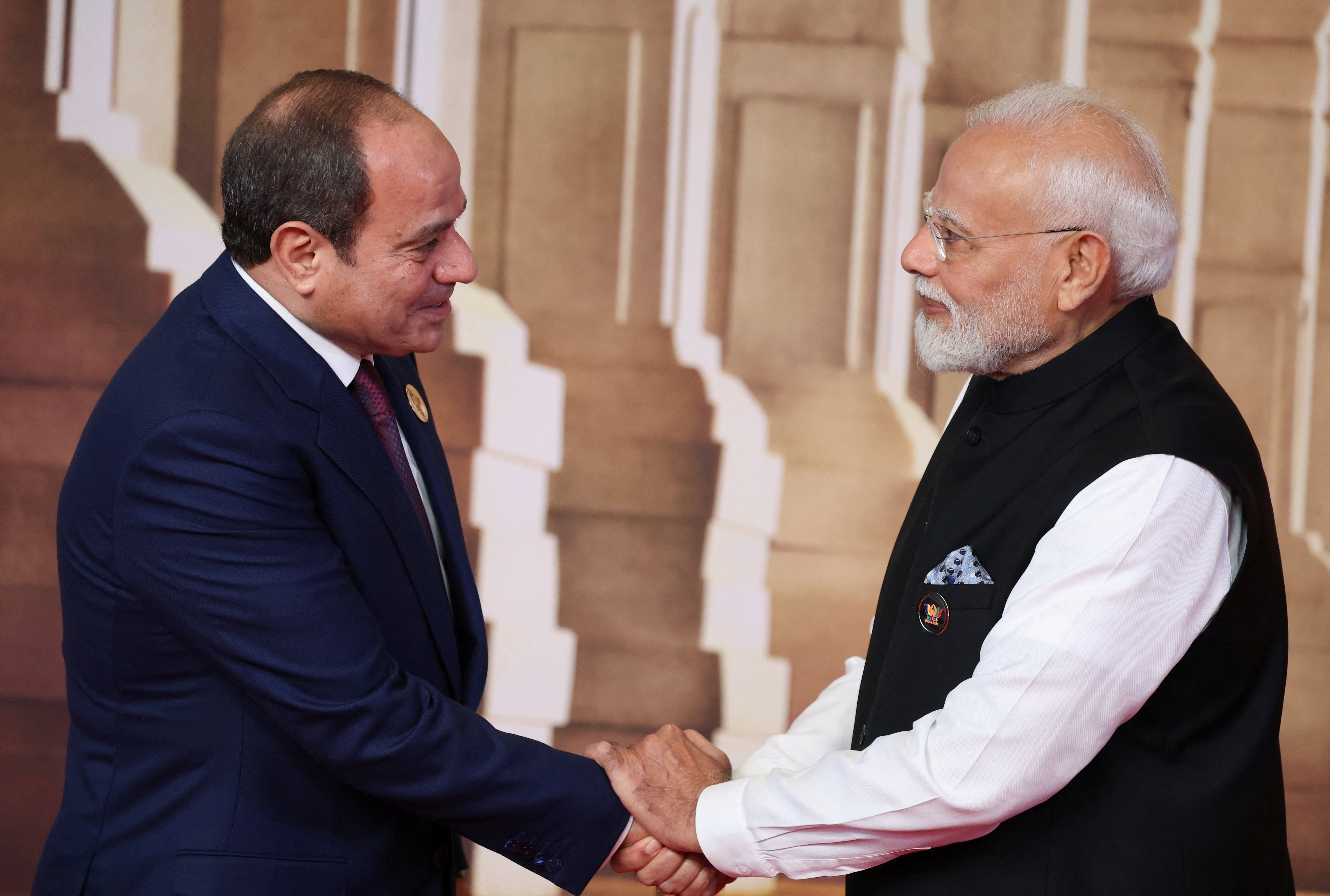 Mr Modi welcomes Mr El Sisi. Reuters
