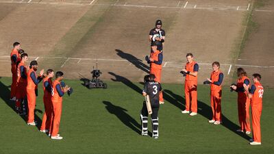 The Netherlands team form a guard of honour as Ross Taylor walks out to bat in his last game for New Zealand. Getty
