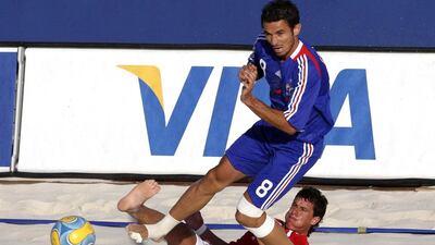 France’s Stephane Francois (8) challenges Uruguay’s Pampero for the ball during their Fifa Beach Soccer World Cup 2008 match in Marseille in 2008. Philippe Laurenson / Reuters