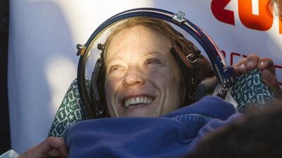 International Space Station (ISS) crew member American cosmonaut Karen Nyberg smiles as she rests after Soyuz TMA-09M capsule carrying the ISS crew landed in a remote area near the town of Zhezkazgan in central Kazakhstan. Shamil Zhumatov / AP Photo