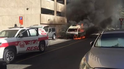 The minibus caught fire on Sheikh Zayed Road on Monday. Courtesy Dubai Civil Defence