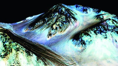 Scientists working on Nasa’s Mars exploration programme announced they had found evidence of liquid water flowing on the surface of the red planet.. Nasa / University of Arizona via AP