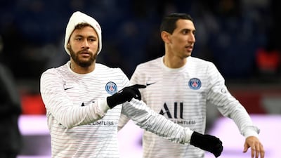 Paris Saint-Germain's Brazilian forward Neymar (L) and Argentine midfielder Angel Di Maria warm up ahead of the match against Lille. AFP