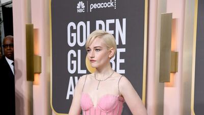 Julia Garner wears Gucci. AFP