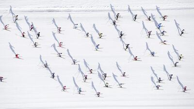 Skiiers are on their way from Maloya to S-Chanf in Switzerland as they participate in the annual Engadin skiing marathon on Sunday, March 12, 2017. Gian Ehrenzeller / AP
