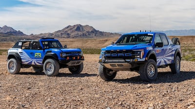 The Ford Bronco Raptor, left, and 3.5-litre F-150 Raptor. Ford could draw on its off-road expertise for the rumoured Mustang Baja. Photo: Ford