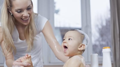 iStock photo of baby taking a bath. Courtesy of iStock
