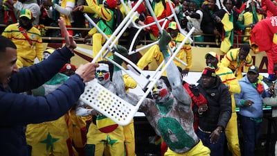 Senegal fans clash with security as they invade the pitch after Morocco were awarded a penalty deep in stoppage time in the final of the Africa Cup of Nations in Rabat. Morocco's Brahim Diaz missed the penalty and Senegal scored in extra time to win 1-0. Reuters