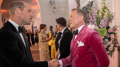 Prince William meets actor Daniel Craig ahead of the world premiere of the James Bond film 'No Time to Die' at the Royal Albert Hall in west London on September 28, 2021. AFP