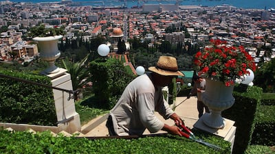 Gardeners tend to one of the 18 terraced gardens that flank the golden-domed Shrine of the Bab July 14, 2008 in Haifa, Israel. The world spiritual centre of the Bahai faith and resting place for the remains of their founder Bab, whose devotees number less than six million worldwide, was declared a World Heritage Site by UNESCO. Getty Images
