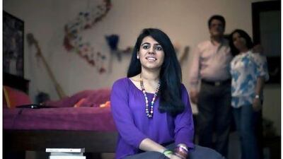 Smriti Joneja, freshly graduated from the British School Al Khubairat in Abu Dhabi, has been offered a scholarship to the University of California at Berkeley. Standing behind her are her parents Ruby and Kapil Joneja.