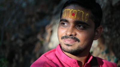Batuk Mahraj waits to pray in the Krishna temple during Diwali in Bur Dubai on Saturday, October 26, 2019. Chris Whiteoak / The National