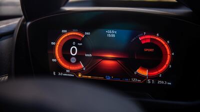 The virtual instrument cluster turns red when you shift into sport mode. BMW