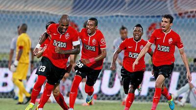 Grafite, left, and his Al Ahli teammates have been on a winning run until the last game against Sharjah when they dropped points. Satish Kumar / The National