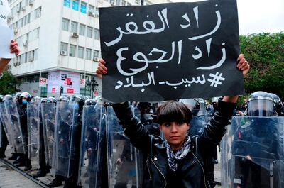 Young Tunisians, particularly graduates, are struggling to find jobs. AP