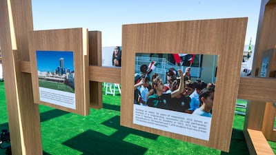 A photo exhibition at the ACS ceremony. Victor Besa / The National