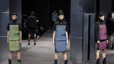 Wang put on a show, with leather that changed colour on the spot when heated, a rotating stage, and a set that resembled a post-apocalyptic world. AP