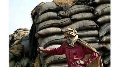 India's logistics structure to store and distribute food is vital to the nation, one reader says. Altaf Qadri / AP Photo