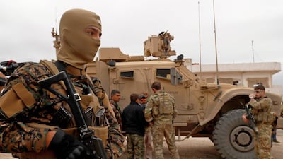 US forces patrol the Kurdish-held town of Al-Darbasiyah in northeastern Syria bordering Turkey. AFP