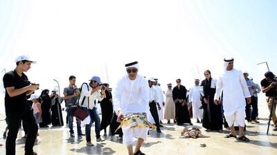Rashed Al Shamsi, Sharjah Aquarium’s curator, releases a turtle at Al Hamriya Beach. Courtesy of Sharjah Museums Department