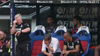 Frank de Boer, centre, has had a miserable time since taking over at Crystal Palace in the summer. Tim Ireland / AP Photo