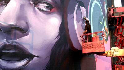 Artists work on a wall at the O1NE in Beirut. Plans are underway to open a branch in Abu Dhabi. Courtesy Sky Management