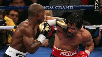 Timothy Bradley lands a blow to the head of Manny Pacquiao in 2012. Getty