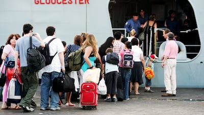 British nationals board the HMS Gloucester in Beirut, Lebanon, in 2006. Getty Images