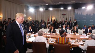 US President Donald Trump arrives late for the Gender Equality Advisory Council breakfast meeting on the second day of the G7 Summit in Quebec. EPA