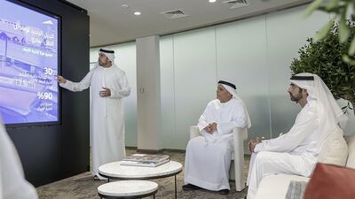 Marine transport officials brief Sheikh Hamdan on the master plan 2030, which also involves the manufacture of the world's first electric abra. Photo: Dubai Media Office