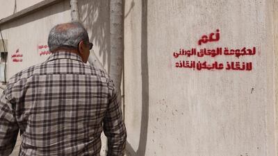 Arabic graffiti reading “Yes to the government of national accord” has cropped up in Tripoli in the last 48 hours. Mahmud Turkia / AFP