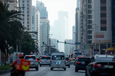 Gusty winds along Hamdan Street in central Abu Dhabi. Victor Besa / The National
