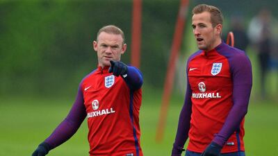 England captain Wayne Rooney, left, alongside striker Harry Kane during training ahead of the international friendly against Portugal. Glyn Kirk / AFP