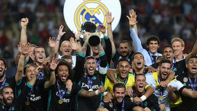 Real Madrid celebrate with the trophy after defeating Manchester United 2-1 during the Super Cup final at Philip II Arena in Skopje, Tuesday, August 8, 2017. Boris Grdanoski / AP Photo