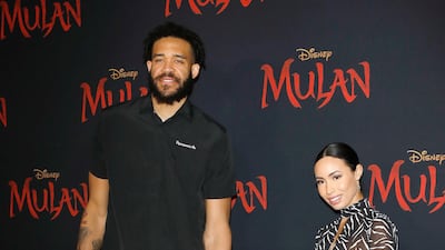 JaVale McGee arrives with his family for the world premiere of 'Mulan'. EPA