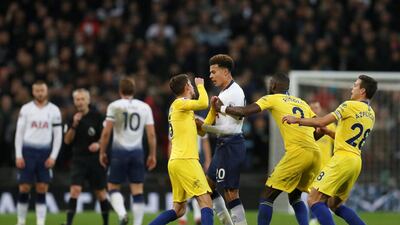 Dele Alli clashes with Jorginho and Antonio Rudiger. Reuters