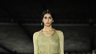 A model walks the runway during the Dior Cruise show 2022 at Panathenaic Stadium on June 17, 2021 in Athens, Greece. Getty Images