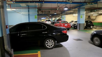 A parked car blocks other vehicles in an Al Mushrif parking area in Abu Dhabi. Ravindranath K / The National