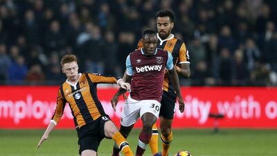 Hull City’s Sam Clucas and Tom Huddlestone in action with West Ham United’s Michail Antonio. Matthew Childs / Reuters