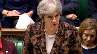 Theresa May tells the House of Commons that her government has concluded it is "highly likely" Russia is responsible for the poisoning of an ex-spy and his daughter. PA via AP