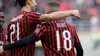 Zlatan Ibrahimovic, left, celebrates with Ante Rebic during AC Milan's win over Udinese. AP Photo