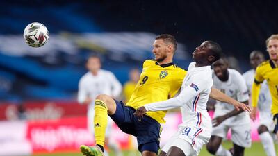 Sweden's Marcus Berg and France's Ferland Mendy. EPA