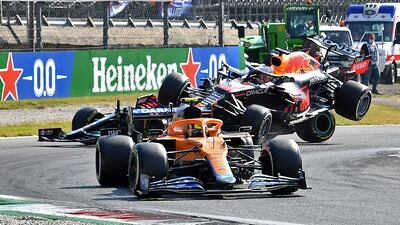 Max Verstappen and Lewis Hamilton crash out of the race. Reuters